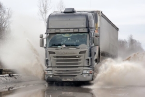 big rig truck speeding down the highway